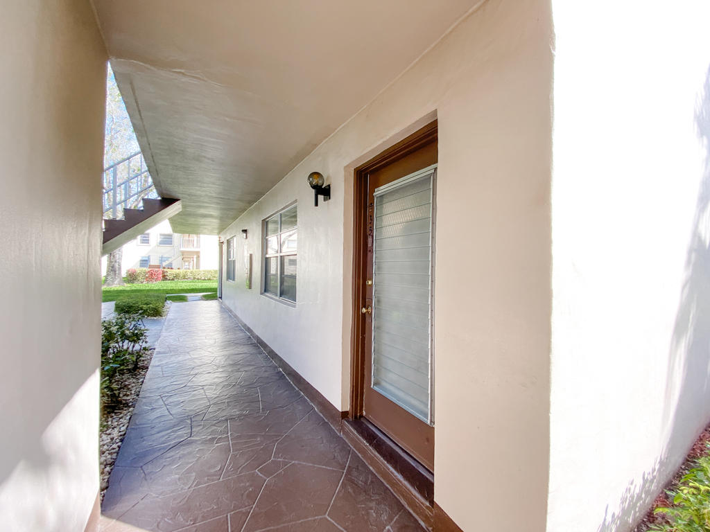 935 Flanders T Delray Beach, FL 33484 - Photo 13 of 13 Front Exposure