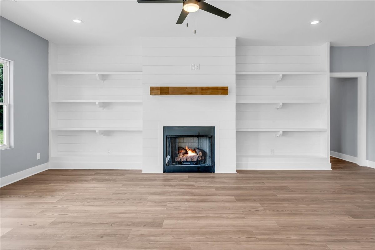 25 Lookout Drive Winchester, TN 37398 - Photo 8 of 61 a view of an empty room with a fireplace and a window