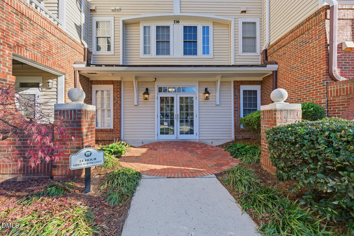 116 Northbrook Drive, Unit 204 Raleigh, NC 27609 - Photo 3 of 94 a front view of a house with garden