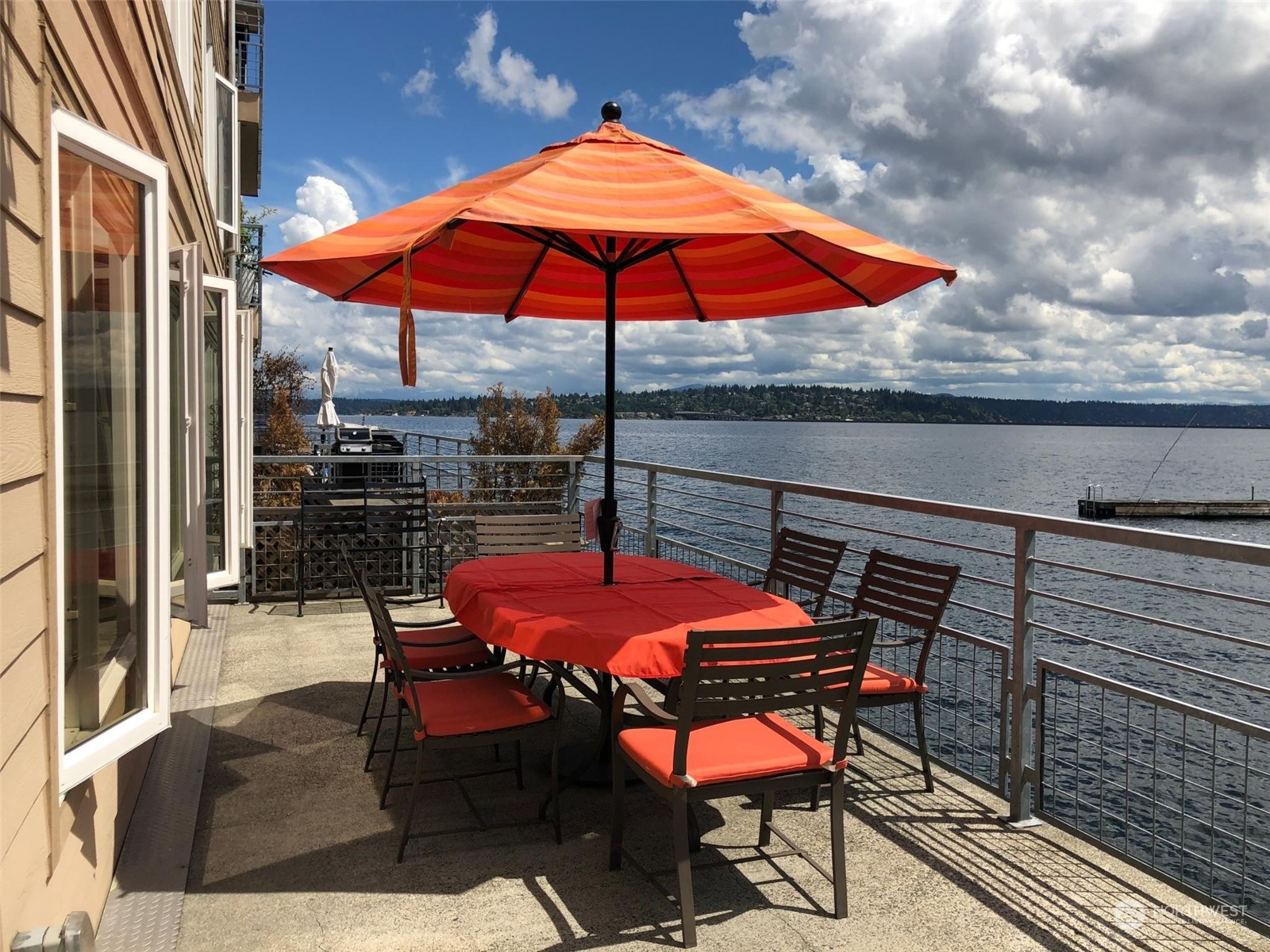an outdoor space with patio and outdoor seating