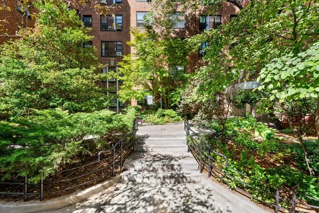 a view of a city with tall buildings