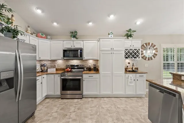 $449,990 | 10069 Lake Miona Way, Oxford, FL 34484