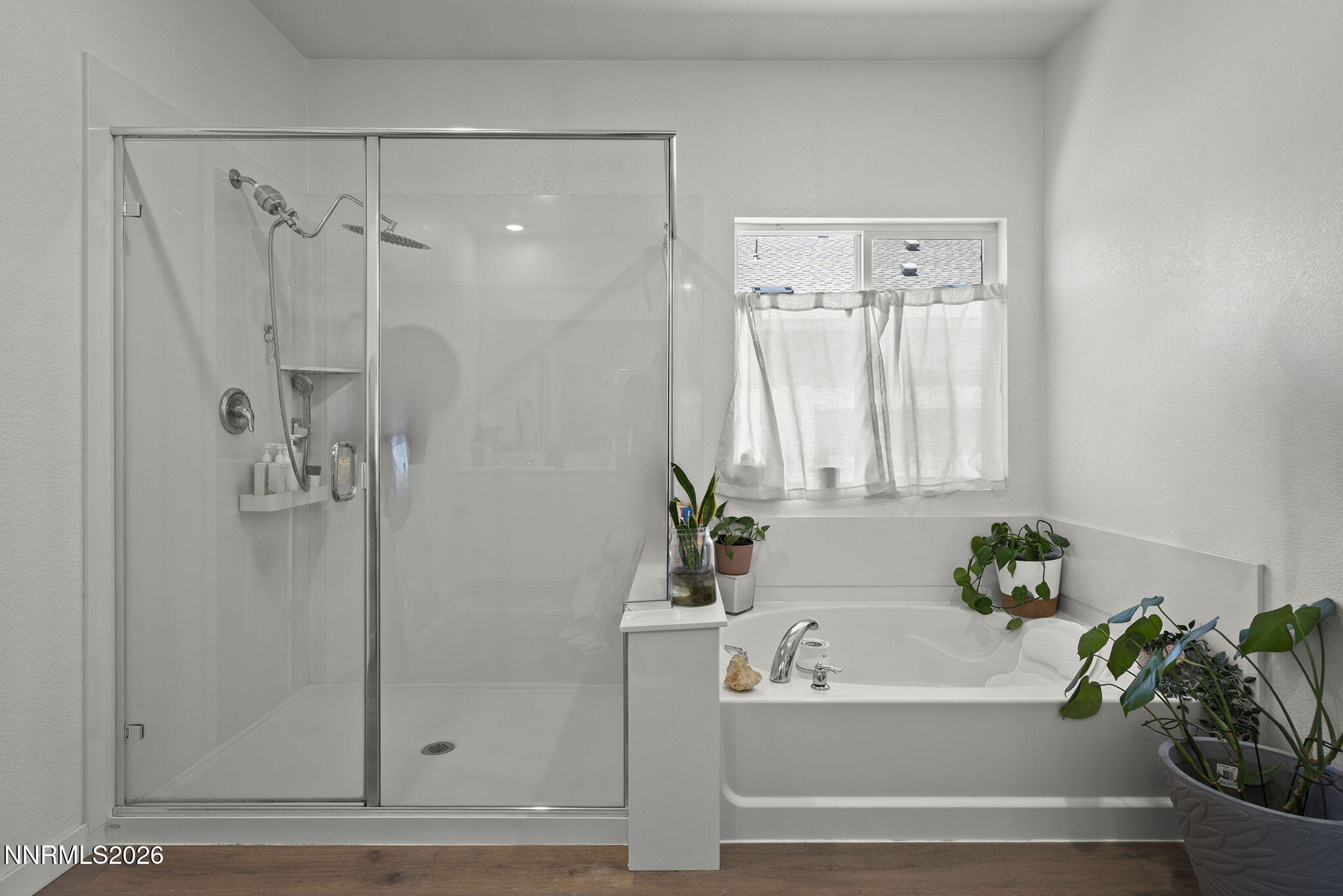 738 Butte Creek Road Dayton, NV 89403 - Photo 14 of 28 a bathroom with a bathtub and a shower
