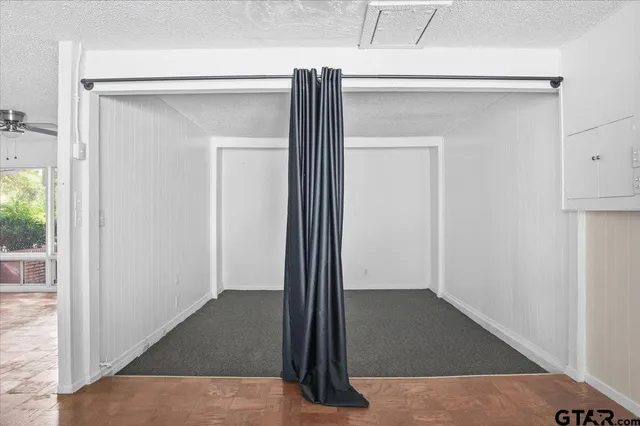 an entryway view with wooden floor