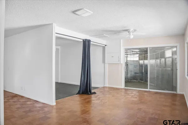 a view of entryway with wooden floor