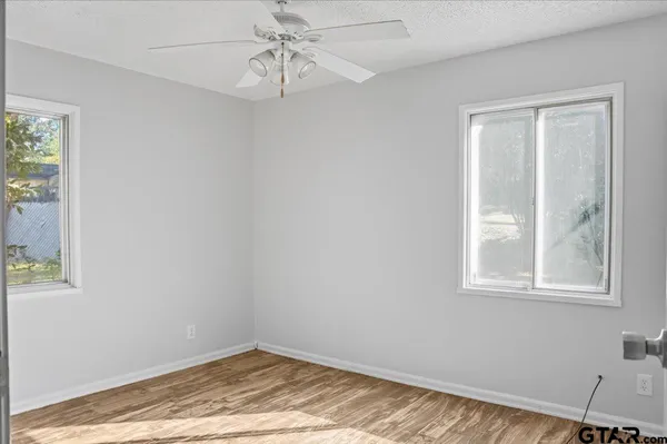 a view of a room that has a window in it