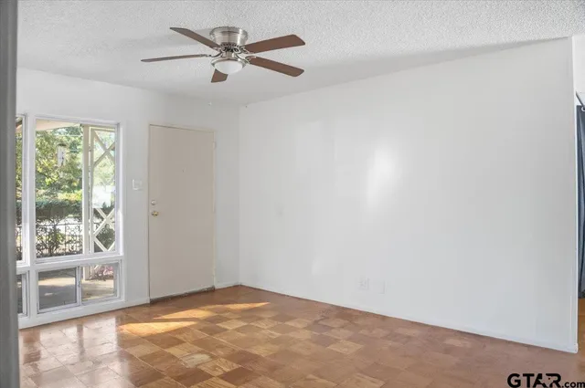 a view of an empty room and window
