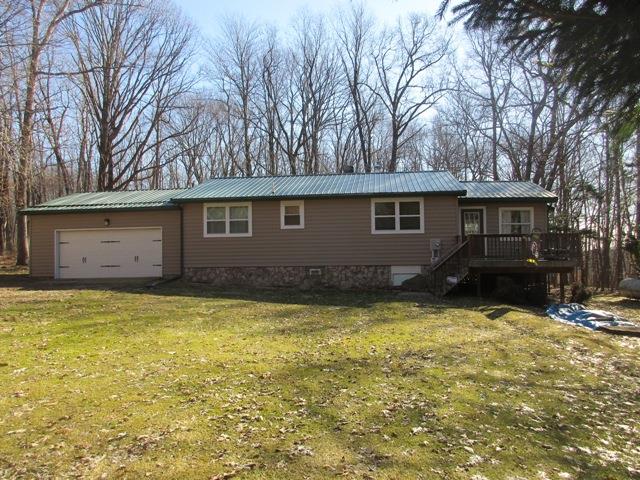 723 Burns Road Polk, PA 16342 - Photo 1 of 34 a view of a house with a yard
