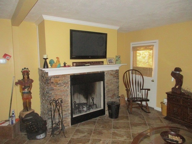 723 Burns Road Polk, PA 16342 - Photo 14 of 34 a living room with furniture and a flat screen tv
