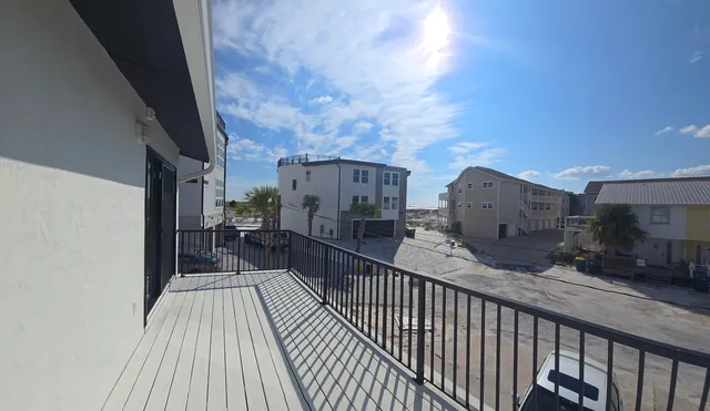 a bathroom with a shower and toilet