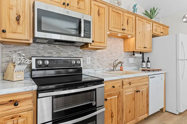 a utility room with washer and dryer