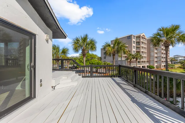 a view of a building with a snow on the road