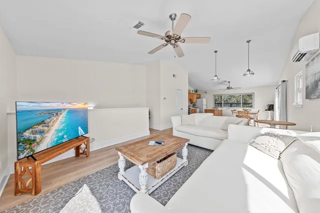 a view of a balcony with wooden floor