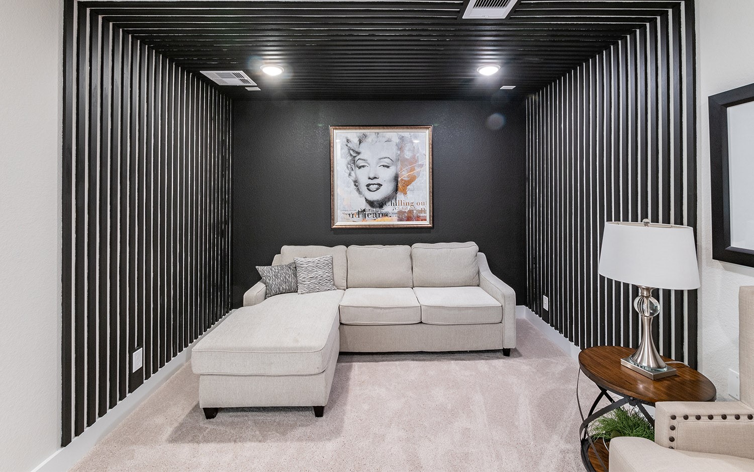 830 Aspen Bluffs Road Crosby, TX 77532 - Photo 19 of 23 a living room with furniture and a chandelier