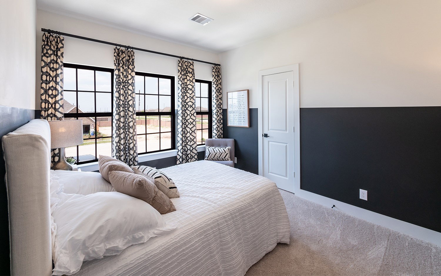 830 Aspen Bluffs Road Crosby, TX 77532 - Photo 20 of 23 a bedroom with a large bed and a window