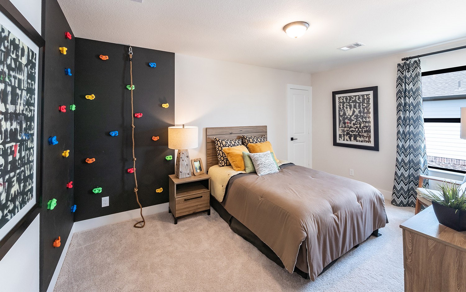 830 Aspen Bluffs Road Crosby, TX 77532 - Photo 23 of 23 a bedroom with a bed and a chandelier