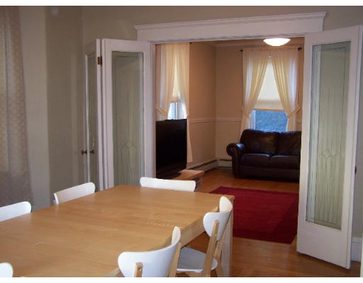 29 Spring Street Woonsocket, RI 02895 - Photo 5 of 15 a living room with furniture and a flat screen tv