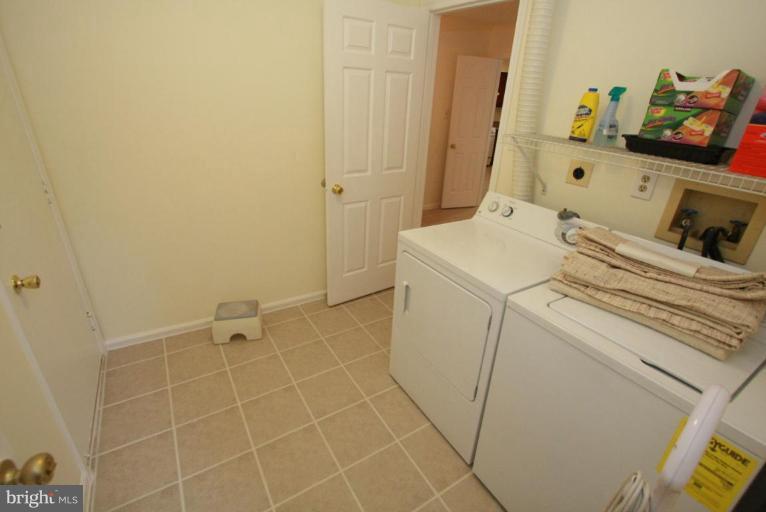 10 Autumn Ridge Court Silver Spring, MD 20906 - Photo 13 of 23 a utility room with dryer and washer