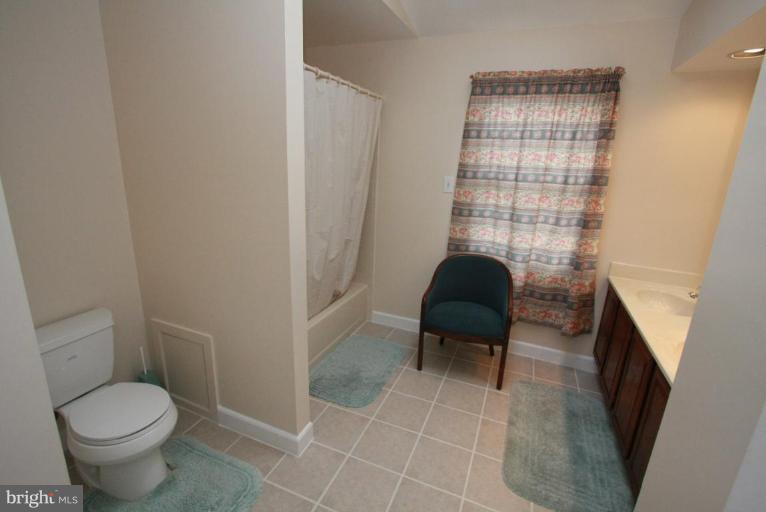 10 Autumn Ridge Court Silver Spring, MD 20906 - Photo 20 of 23 a bathroom with a toilet and a shower