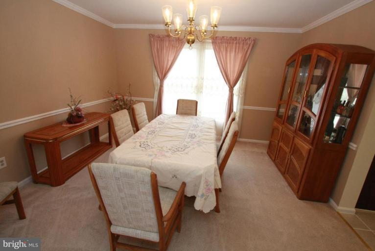 10 Autumn Ridge Court Silver Spring, MD 20906 - Photo 6 of 23 a dining room with furniture and window