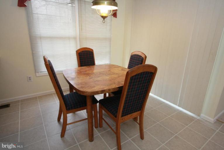 10 Autumn Ridge Court Silver Spring, MD 20906 - Photo 8 of 23 a dining room with furniture and window