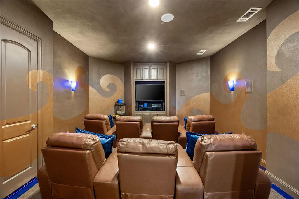 219 Mohundro Road Ferris, TX 75125 - Photo 25 of 40 a living room with furniture and a flat screen tv