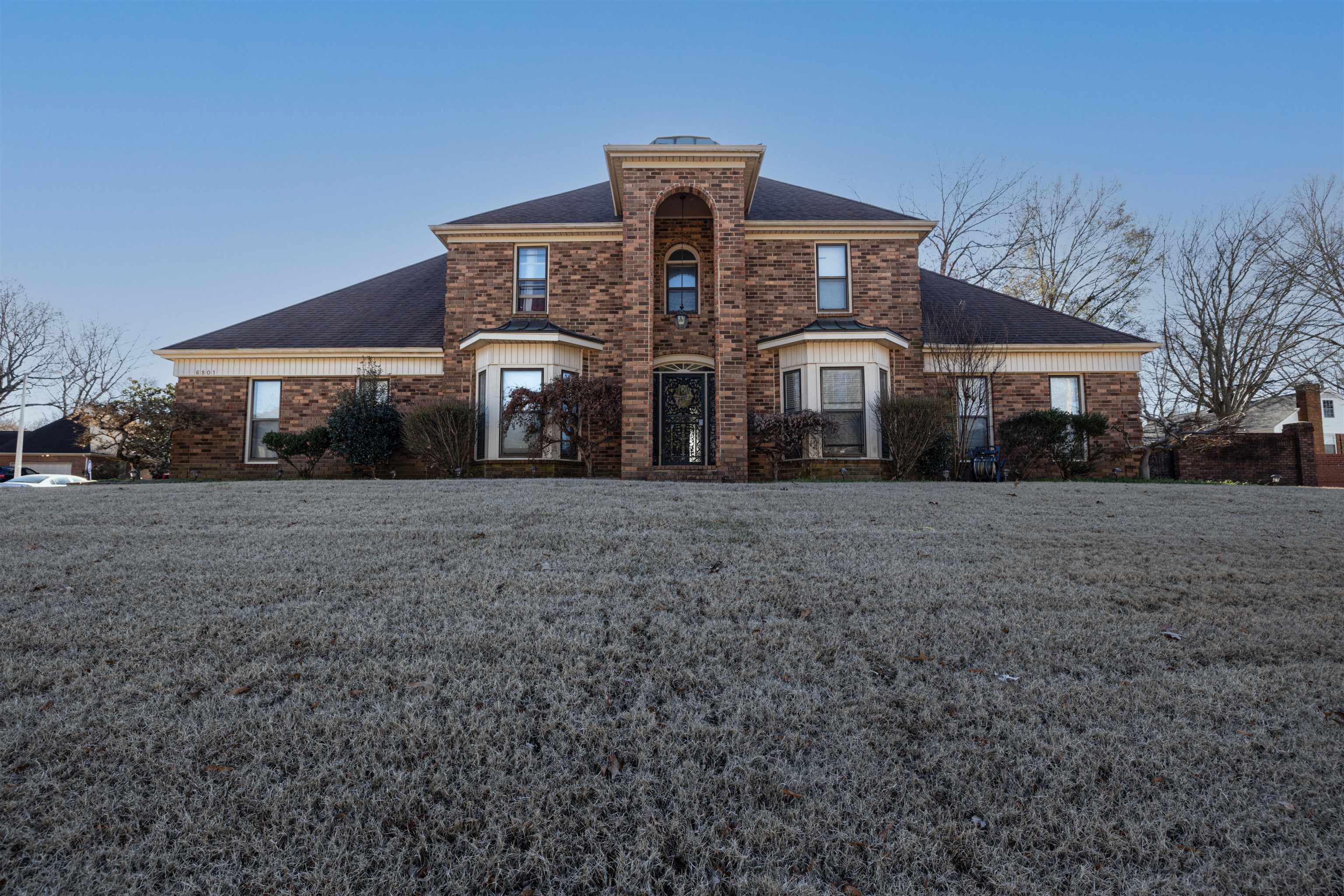 6801 Stout Road Memphis, TN 38119 - Photo 1 of 25 a front view of house with yard