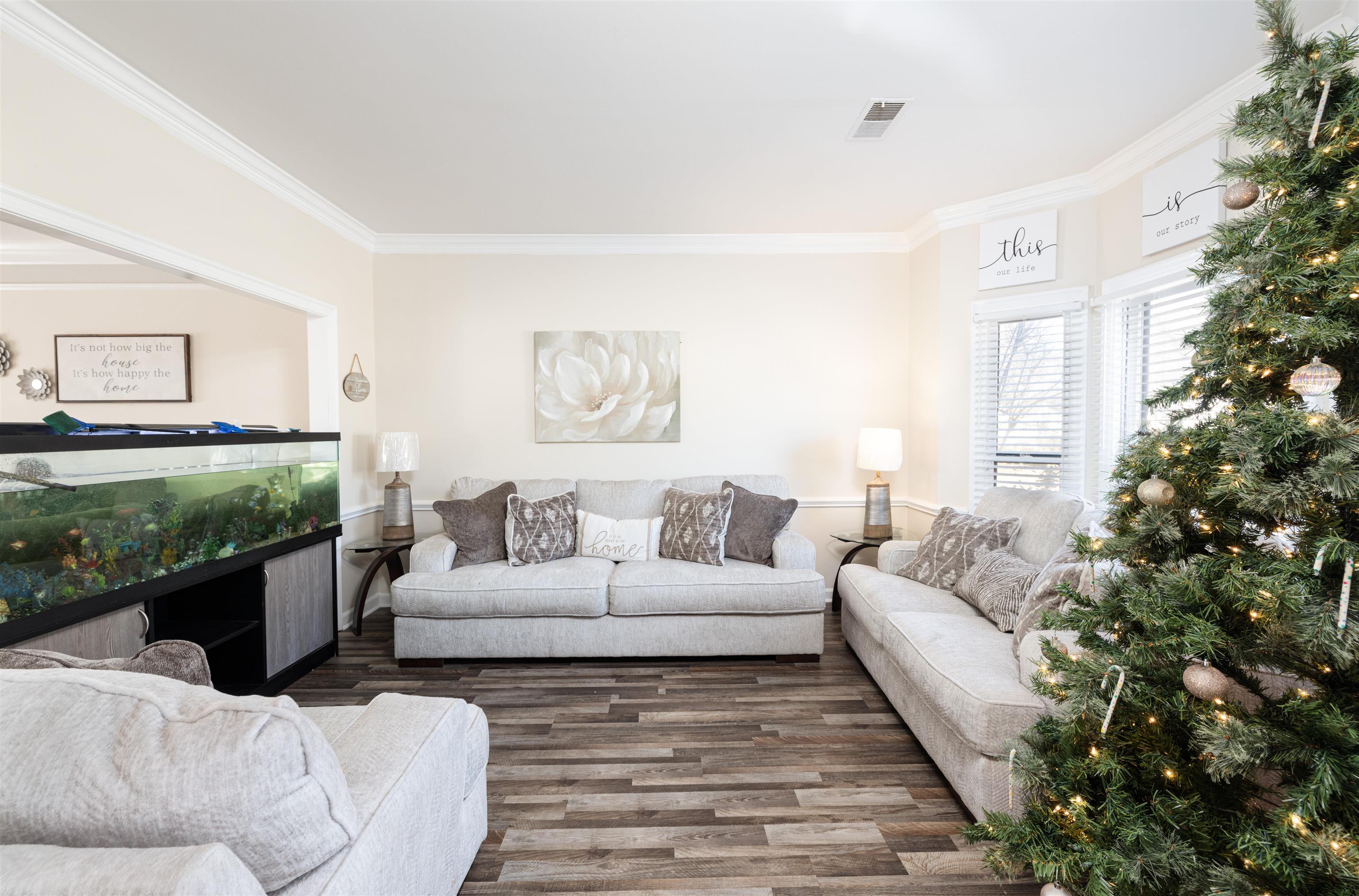 6801 Stout Road Memphis, TN 38119 - Photo 3 of 25 a living room with furniture and a fireplace