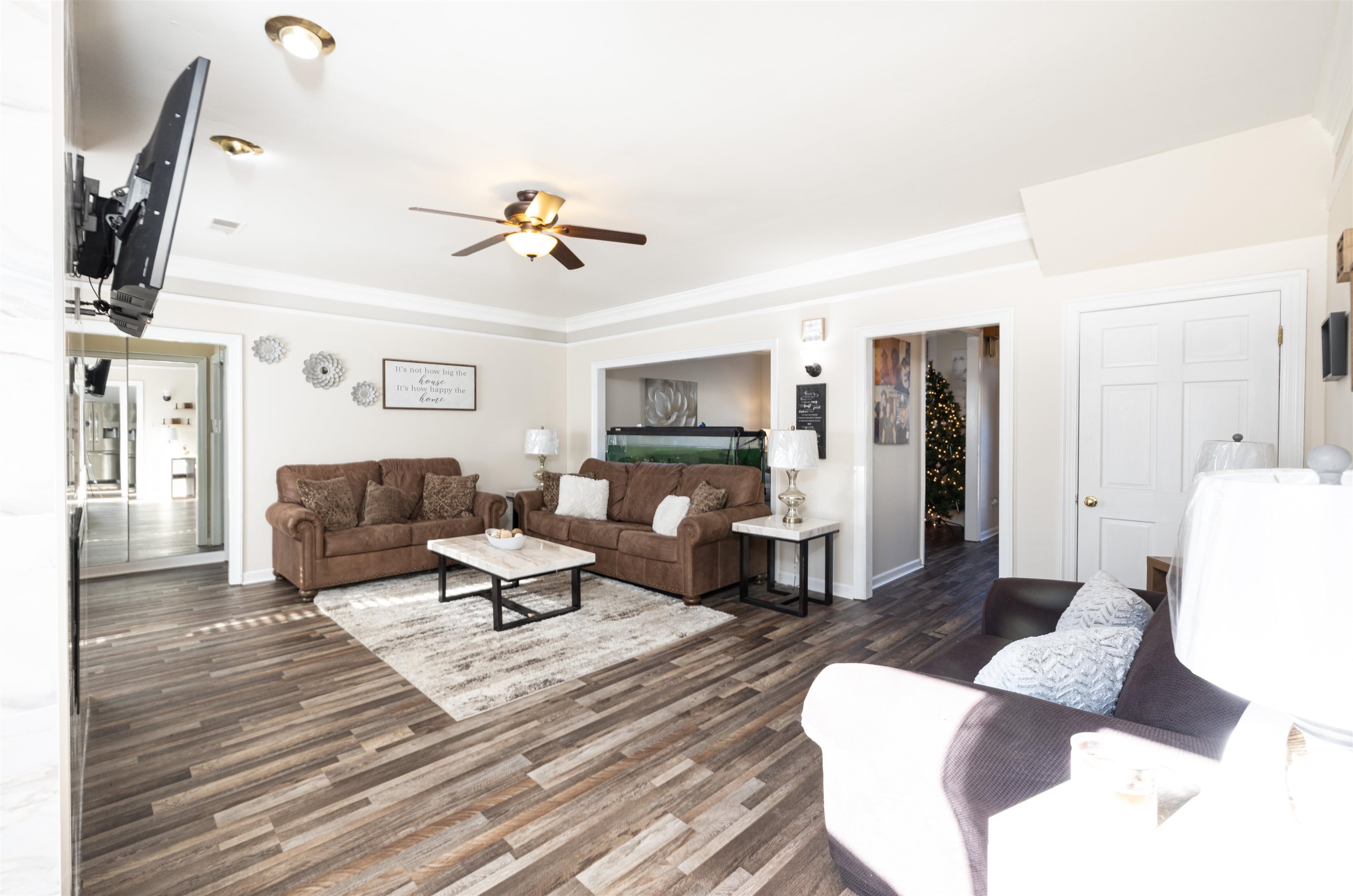 6801 Stout Road Memphis, TN 38119 - Photo 5 of 25 a living room with furniture and a flat screen tv