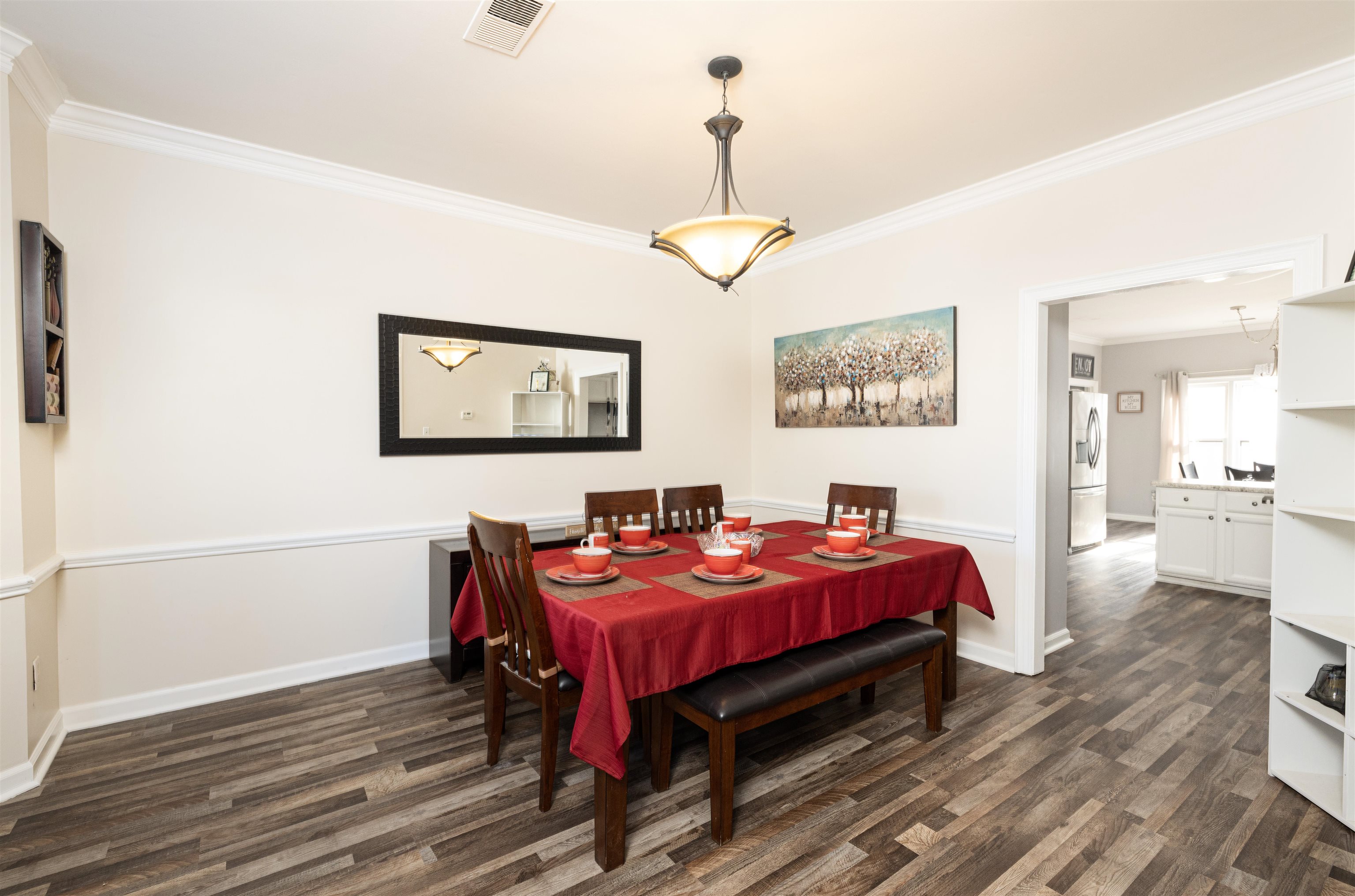 6801 Stout Road Memphis, TN 38119 - Photo 7 of 25 a bed room with a bed and a chandelier