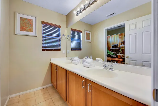 a patio with table and chairs