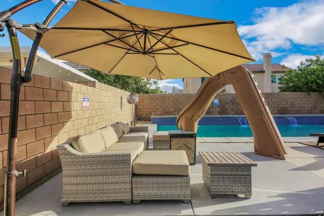 a view of a house with swimming pool