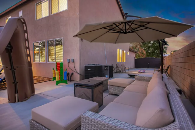 a outdoor space with lots of tables and chairs