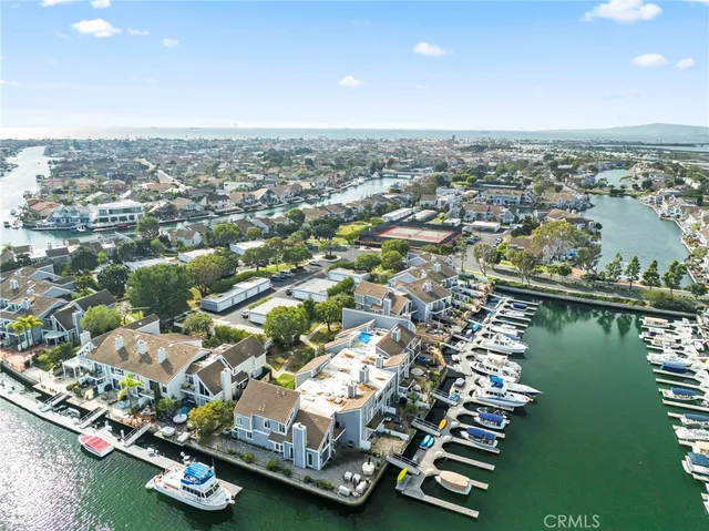 an aerial view of a house with a ocean view