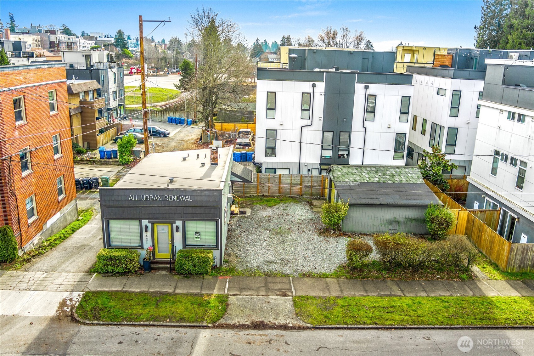 4431 Southwest Admiral Way Seattle, WA 98116 - Photo 2 of 25 a front view of a house with garden