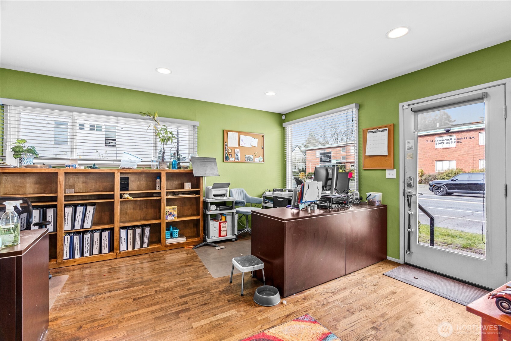 4431 Southwest Admiral Way Seattle, WA 98116 - Photo 4 of 25 a view of a workspace with furniture and a window