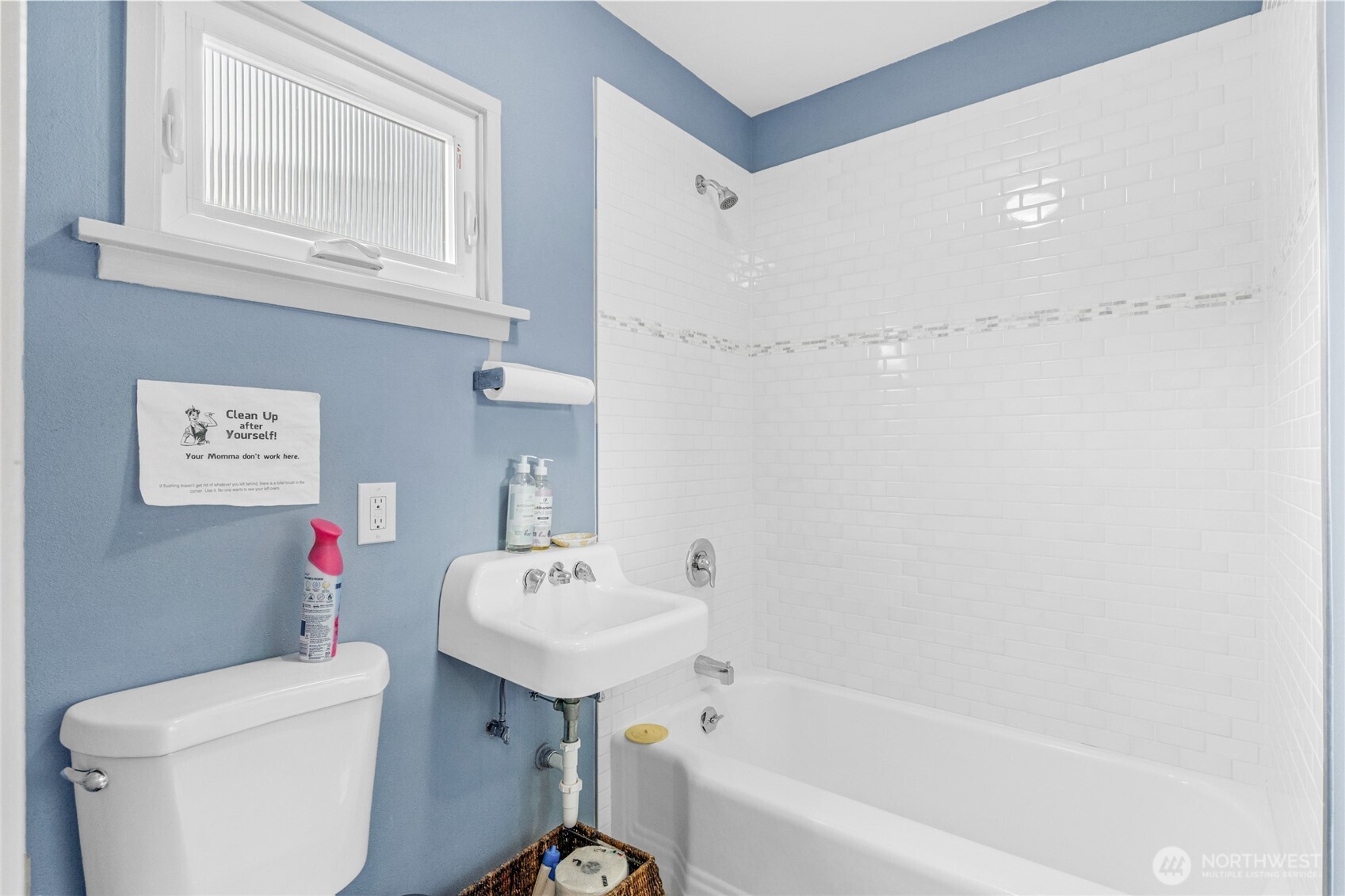 4431 Southwest Admiral Way Seattle, WA 98116 - Photo 10 of 25 a bathroom with a sink a toilet and shower