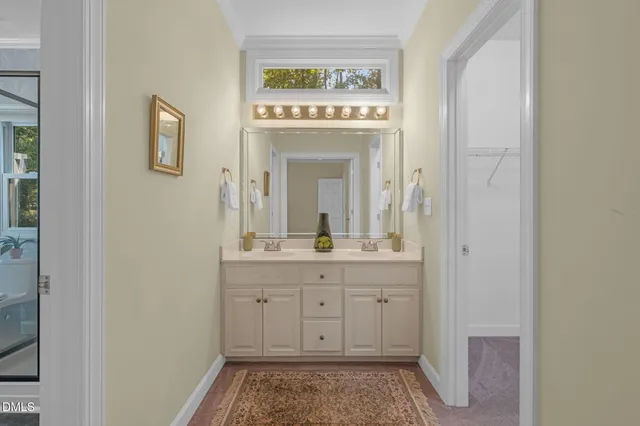 a view of a hallway to an empty room