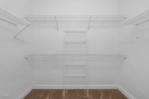 a view of a room with racks on the wall