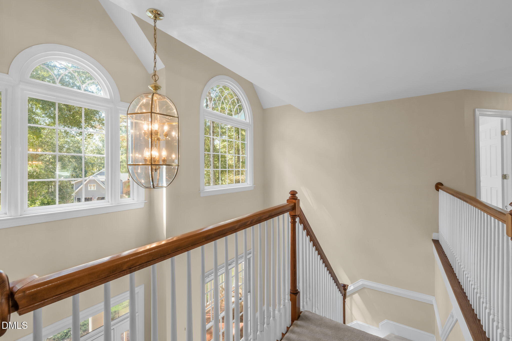 5309 Shoreline Court Holly Springs, NC 27540 - Photo 26 of 46 a view of staircase with large window