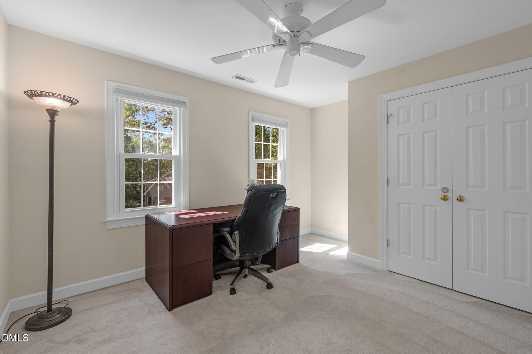 5309 Shoreline Court Holly Springs, NC 27540 - Photo 27 of 46 a view of a workspace with furniture and a window