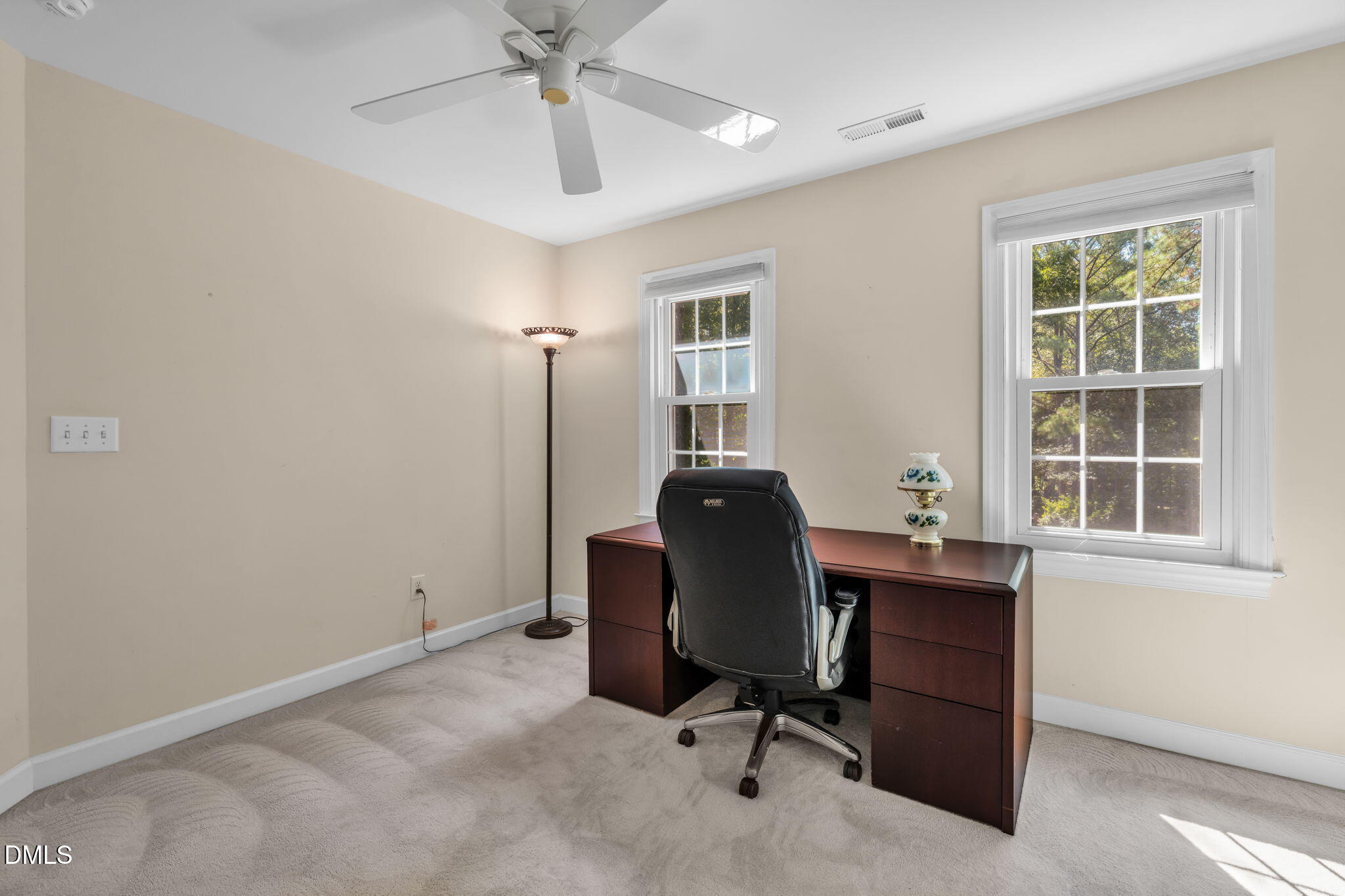 5309 Shoreline Court Holly Springs, NC 27540 - Photo 28 of 46 a view of a workspace with furniture and a window