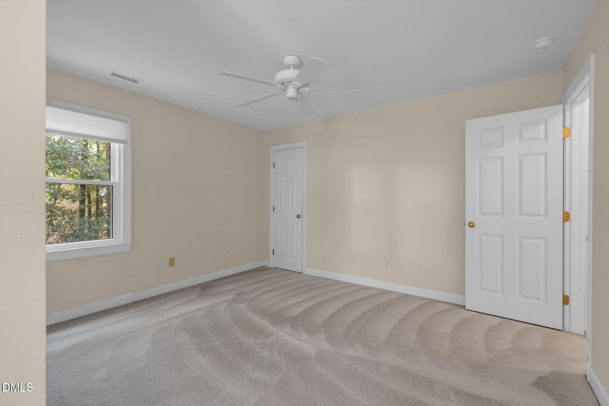 5309 Shoreline Court Holly Springs, NC 27540 - Photo 32 of 46 a view of an empty room with a window