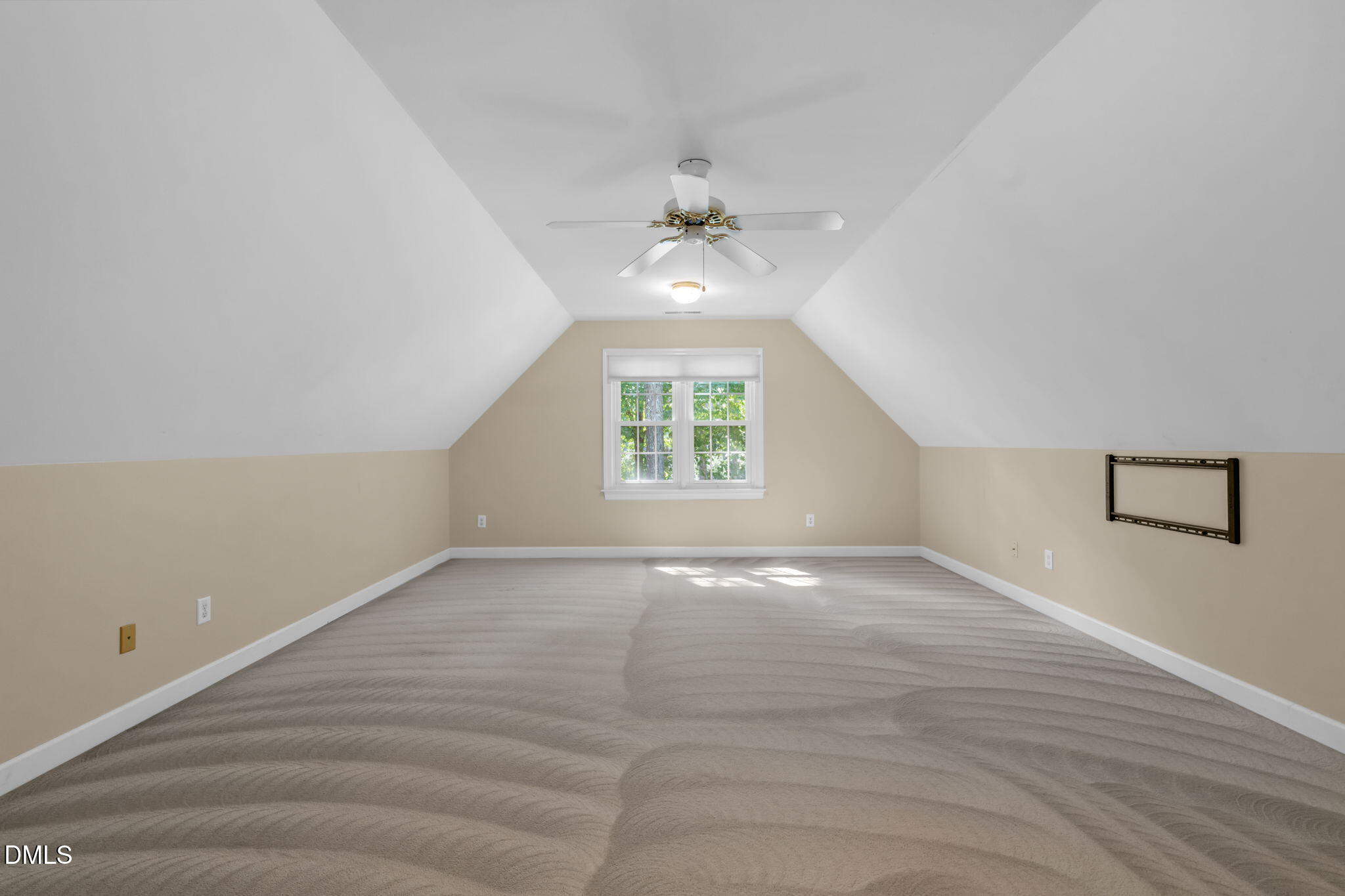 5309 Shoreline Court Holly Springs, NC 27540 - Photo 36 of 46 an empty room with windows and ceiling fan
