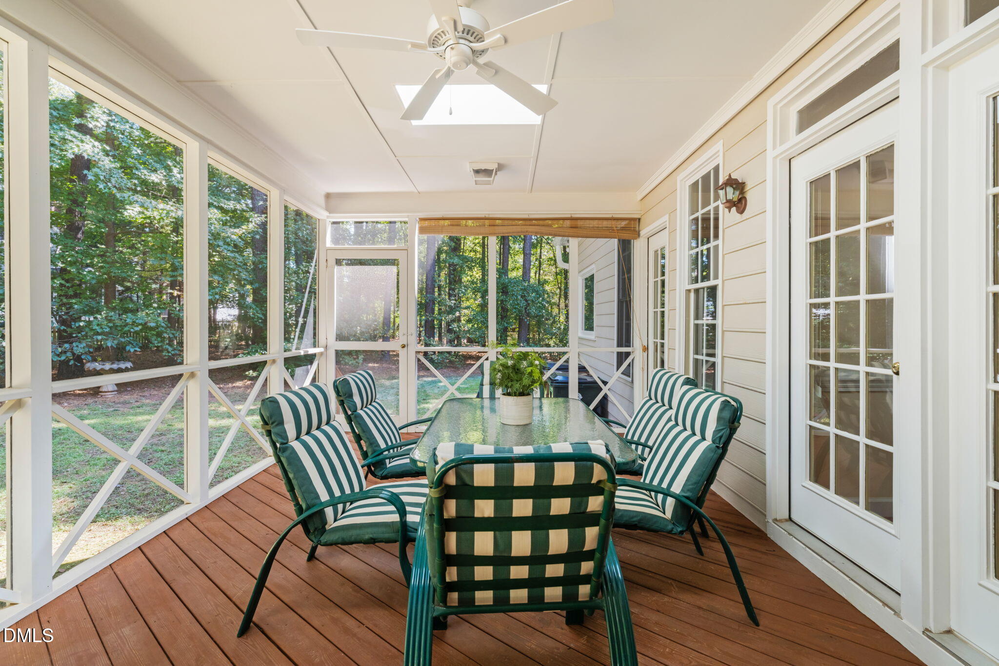 5309 Shoreline Court Holly Springs, NC 27540 - Photo 39 of 46 a view of a dining room with furniture window and outside view