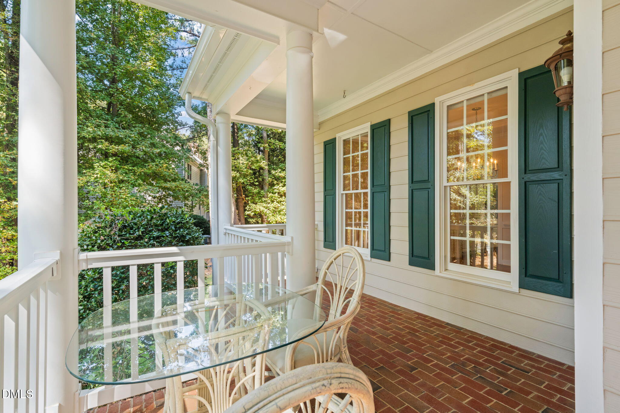 5309 Shoreline Court Holly Springs, NC 27540 - Photo 3 of 46 a view of a balcony with chair and the potted plant