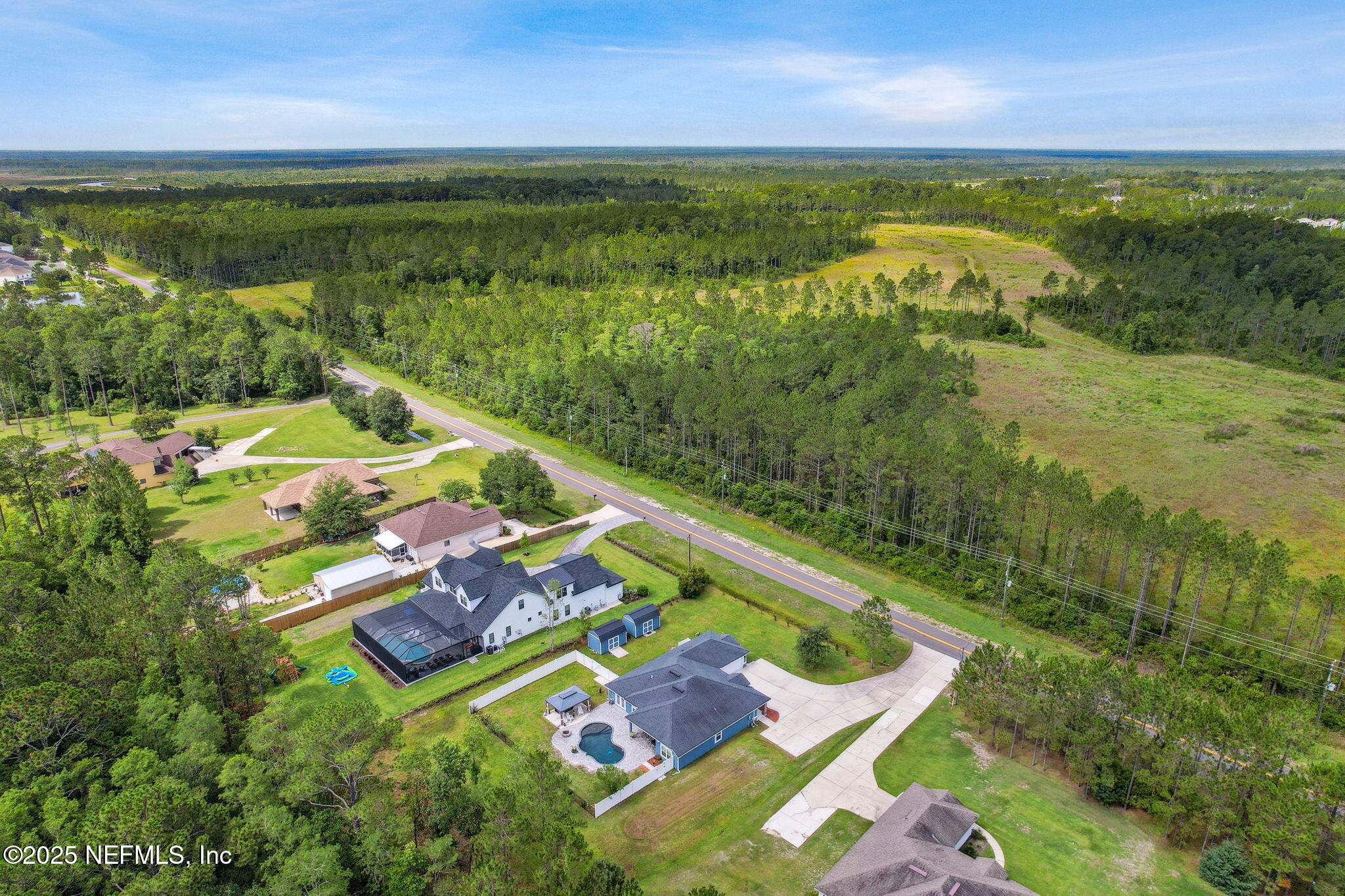 75652 Edwards Road Yulee, FL 32097 - Photo 3 of 26 a view of an outdoor space and a lake view