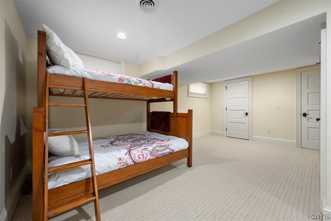 1844 West Lake Road Skaneateles, NY 13152 - Photo 38 of 49 Bedroom #5 located in the basement with full egres