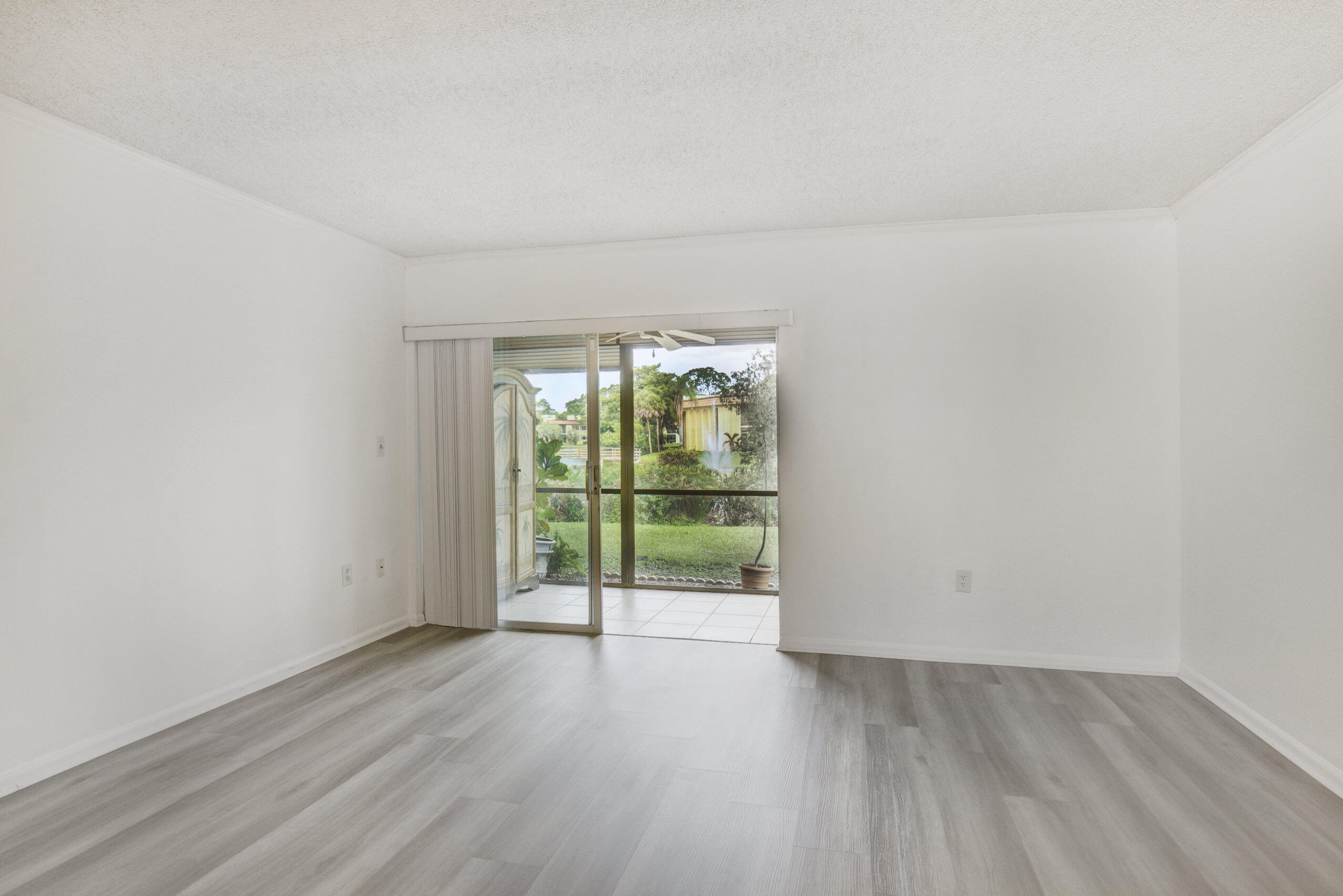866 Southwest 9th St Circle, Unit 106 Boca Raton, FL 33486 - Photo 11 of 24 Exit to the Yard