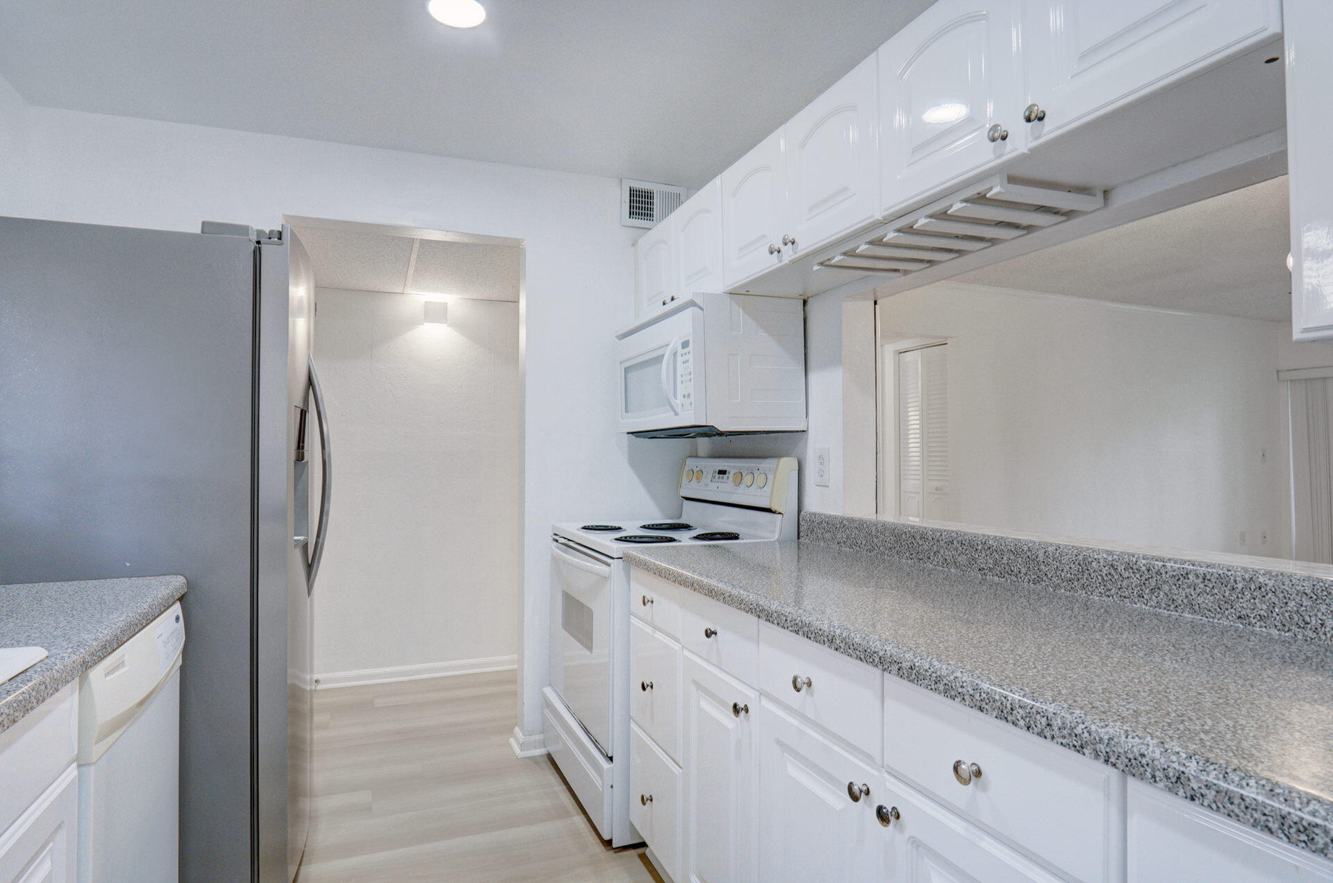 866 Southwest 9th St Circle, Unit 106 Boca Raton, FL 33486 - Photo 13 of 24 Kitchen with Pass Thru
